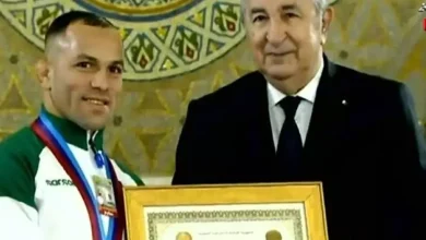 صورة رئيس الجمهورية يترأس مراسم تكريم النخب الرياضية الوطنية العسكرية